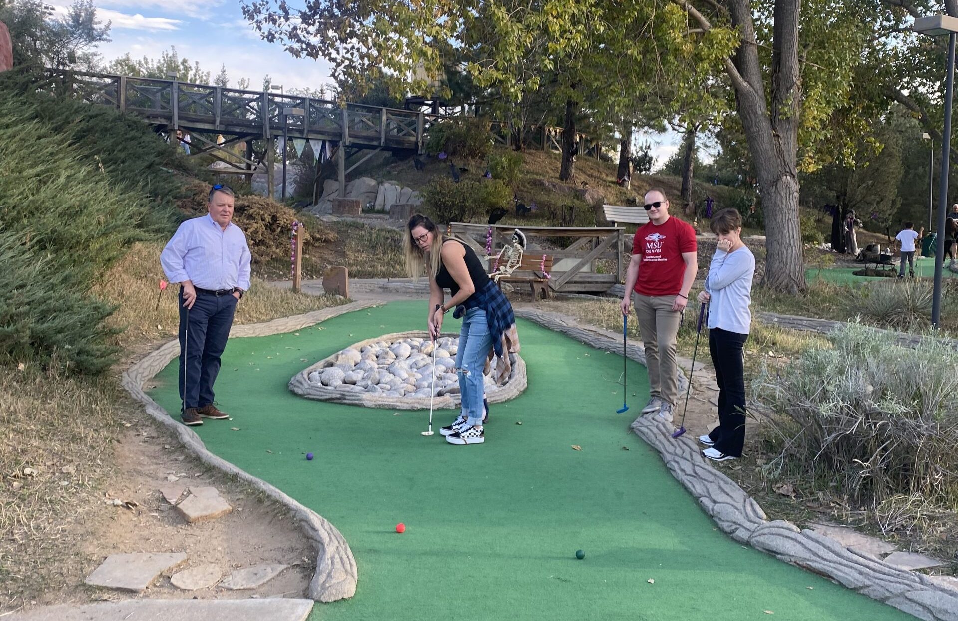 Littleton staff enjoy a putt-putt golf team building outing